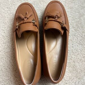 A pair of flats made by Talbots. Women’s medium. Barely used.